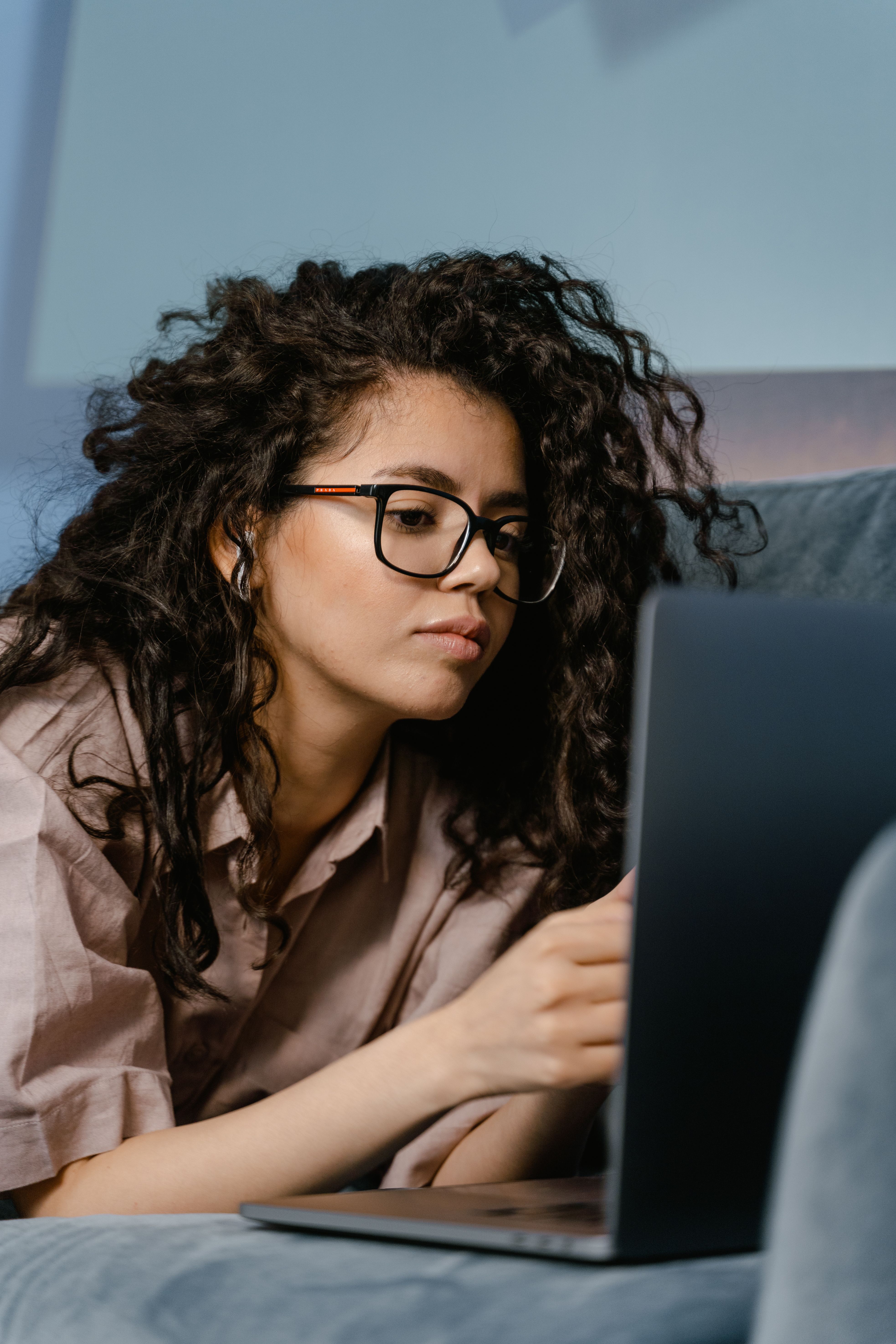 Freelancer reviewing work on a laptop